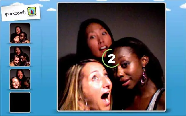 Guests enjoying a photo booth at an event